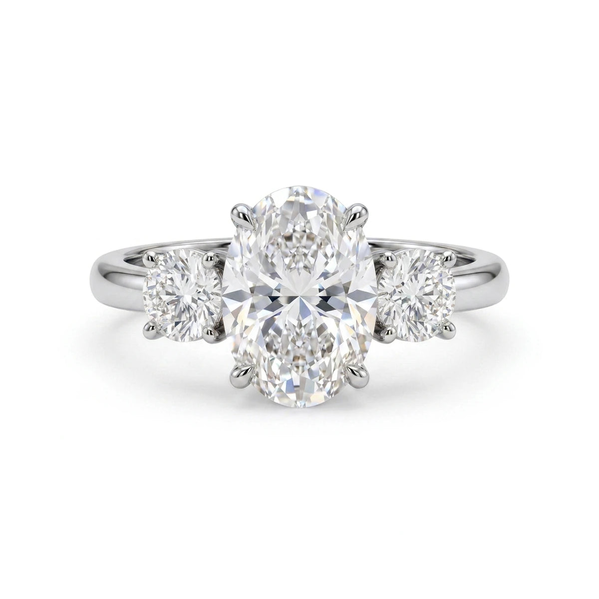 Oval Three-Stone Ring with Round Sides — oval and round lab grown diamond ring in solid hallmarked gold