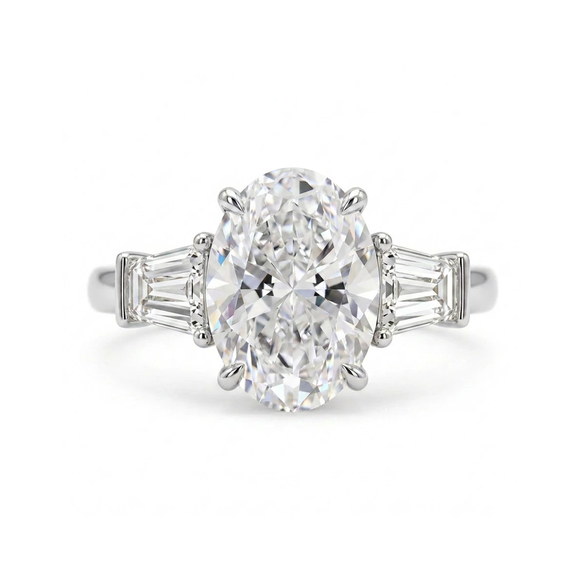 Oval Three-Stone Ring with Tapered Baguette Sides — oval and baguette lab grown diamond ring in solid hallmarked gold