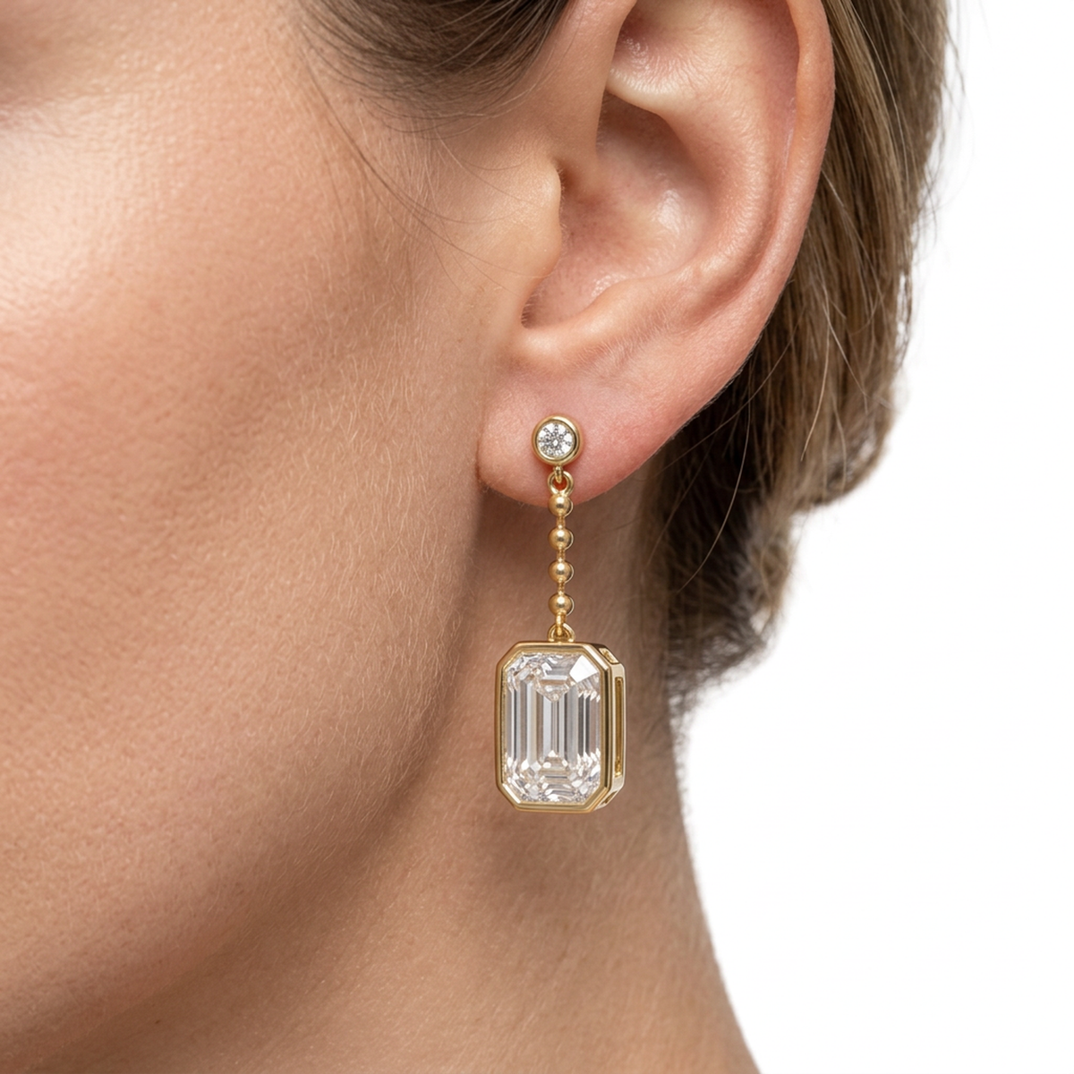 Bezel Emerald Cut Diamond Chain Drop Earrings — emerald and round lab grown diamond earrings in solid hallmarked gold