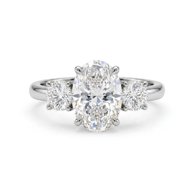 Oval Three-Stone Ring with Round Sides — oval and round lab grown diamond ring in solid hallmarked gold