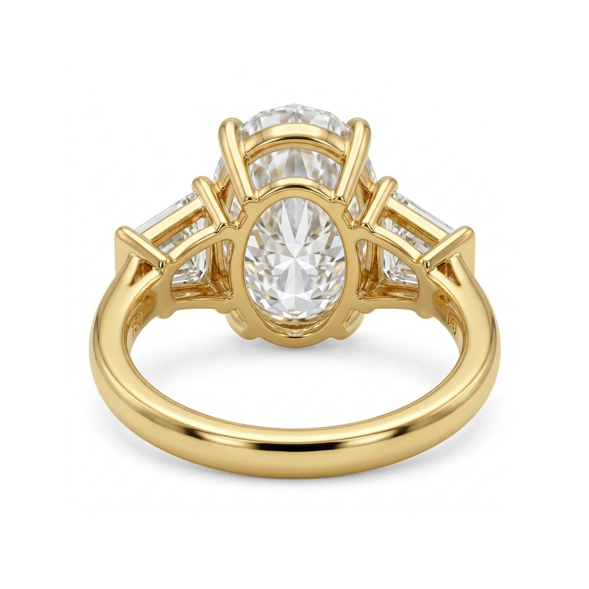 Oval Three-Stone Ring with Tapered Baguette Sides — oval and baguette lab grown diamond ring in 9K, 14K or 18K gold