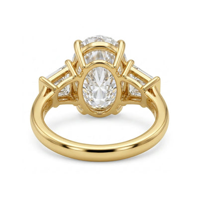 Oval Three-Stone Ring with Tapered Baguette Sides — oval and baguette lab grown diamond ring in 9K, 14K or 18K gold