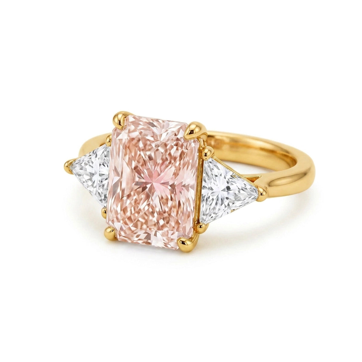 Radiant Fancy Vivid Pink Three-Stone Ring with Trilliant Sides in IGI certified lab grown diamond and BIS hallmarked gold