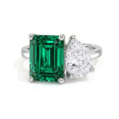 Fancy Vivid Green Emerald & Pear Toi et Moi Ring — emerald and pear lab grown diamond ring in solid hallmarked gold